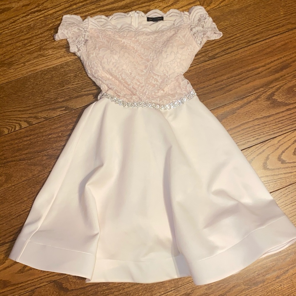 A pink lace, sparkly dress.